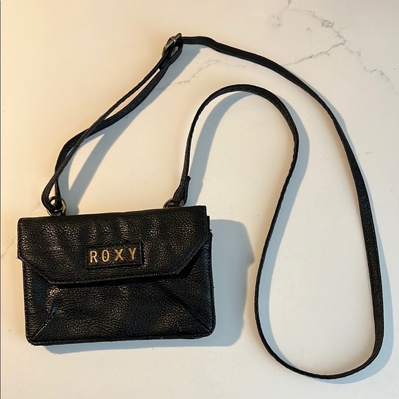 Roxy Handbags - Roxy Black Leather Crossbody Bag with Flap Closure